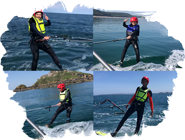 Groupe de kitesurfeurs sur le sable